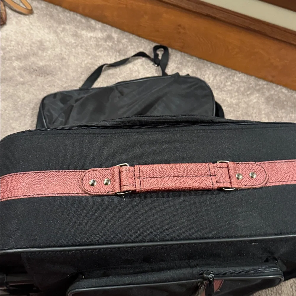 Wilson Black Football Roller Suitcase